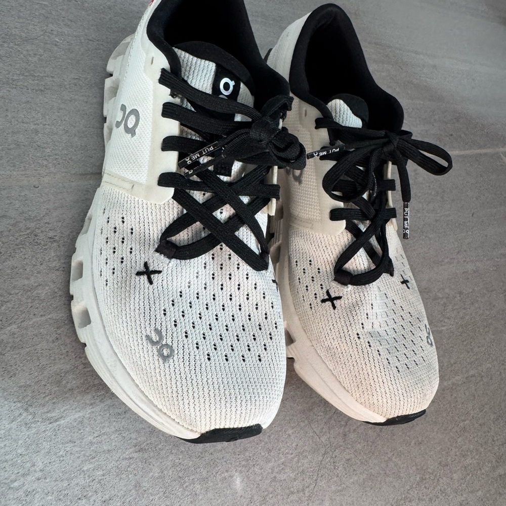 On Running White and Black Sneakers